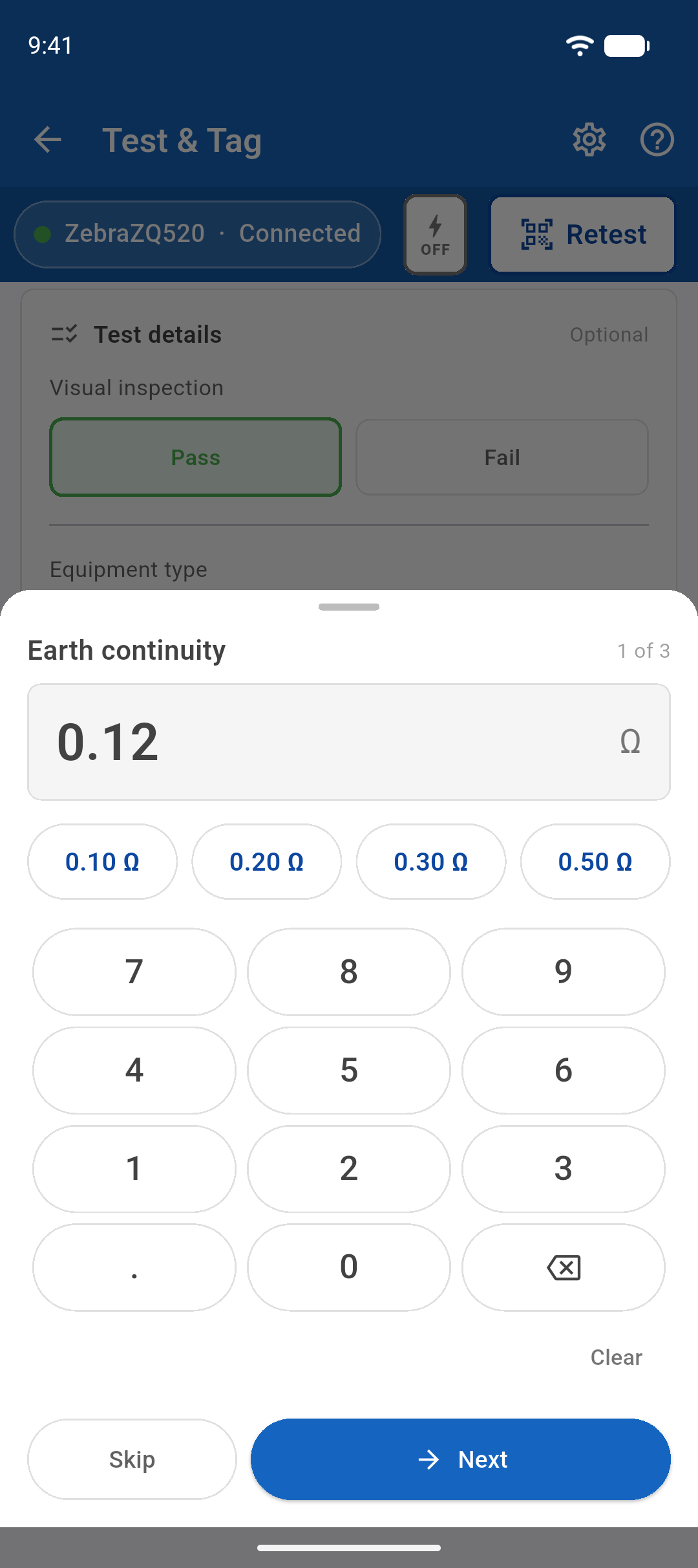The reading keypad open over the test details, with an earth continuity reading being typed in.